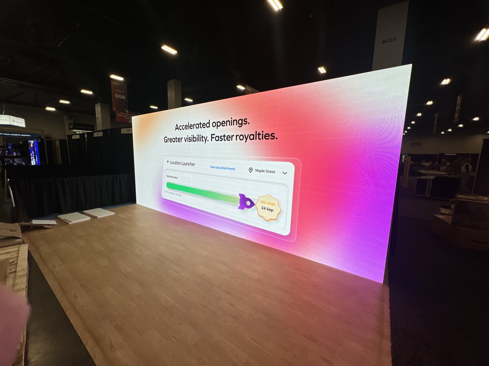 Trade show booth with a large LED video wall